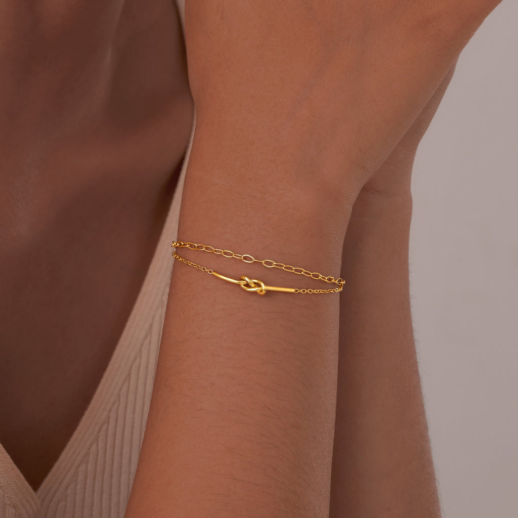 Versátil nueva pulsera doble de acero inoxidable anudada para mujer
