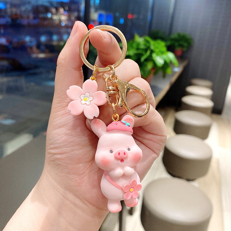 Llavero creativo con personalidad de cerdito de flor de cerezo