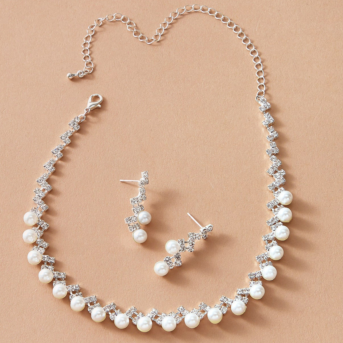 Elegantes Blitz-Strass-Perlen-Halsketten- und Ohrring-Set