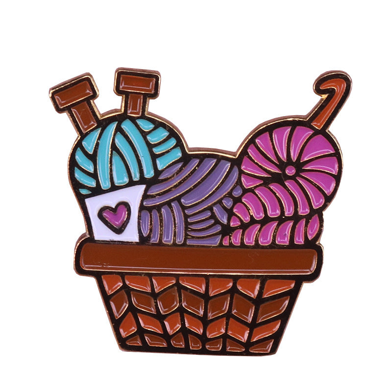 Broche cesta de lana