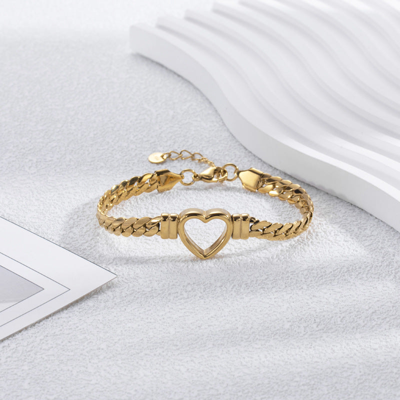Pulsera de acero de titanio con corazón hueco, sencilla y a la moda
