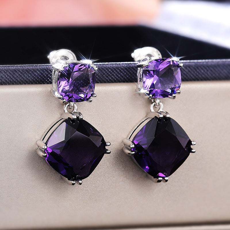 Elegantes aretes cuadrados de circonita morada misteriosa