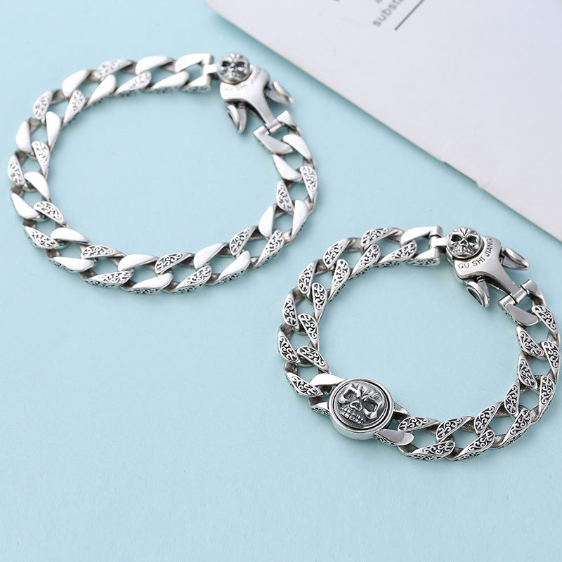 Pulsera de plata de ley con adorno para hombre, diseño de calavera giratoria, estilo retro y patrón de hierba china
