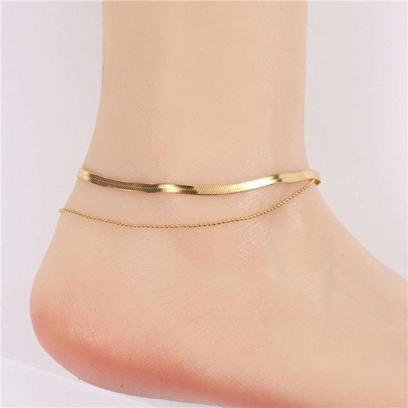 Tobillera con forma de hueso de serpiente