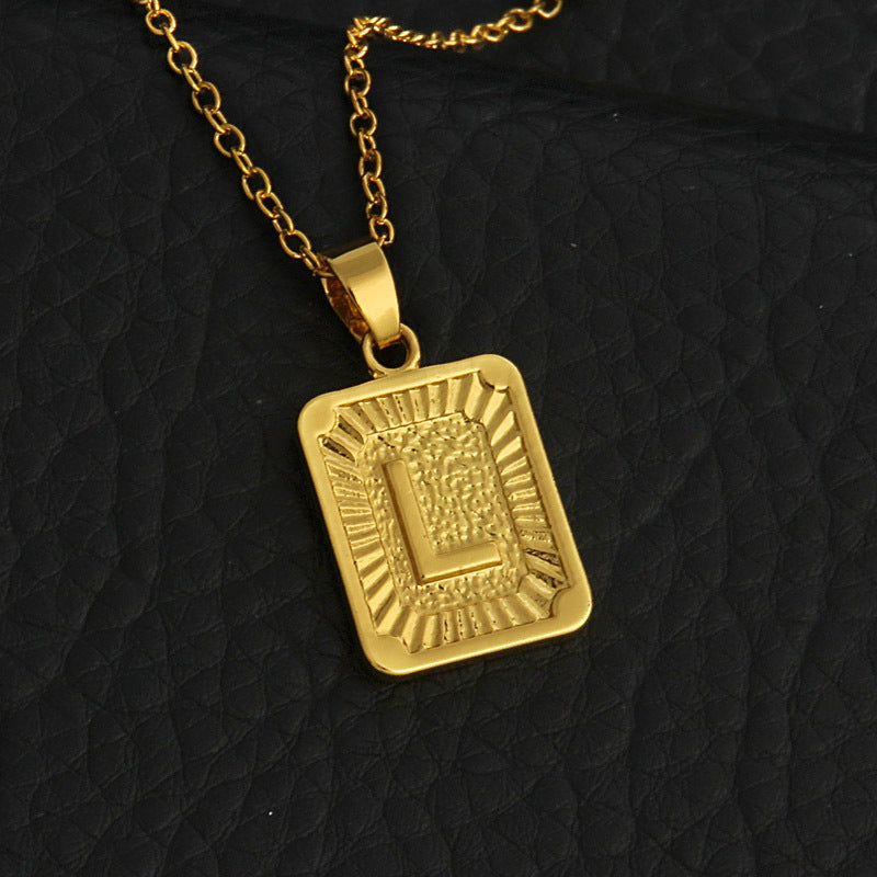 Gold letter necklace