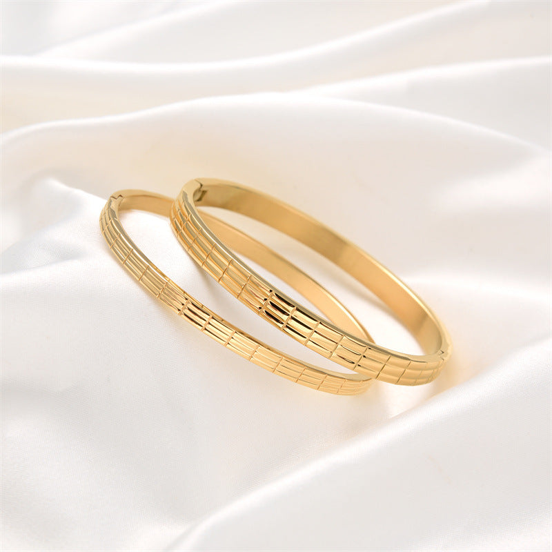 Brazalete de oro y plata de acero de titanio rosa