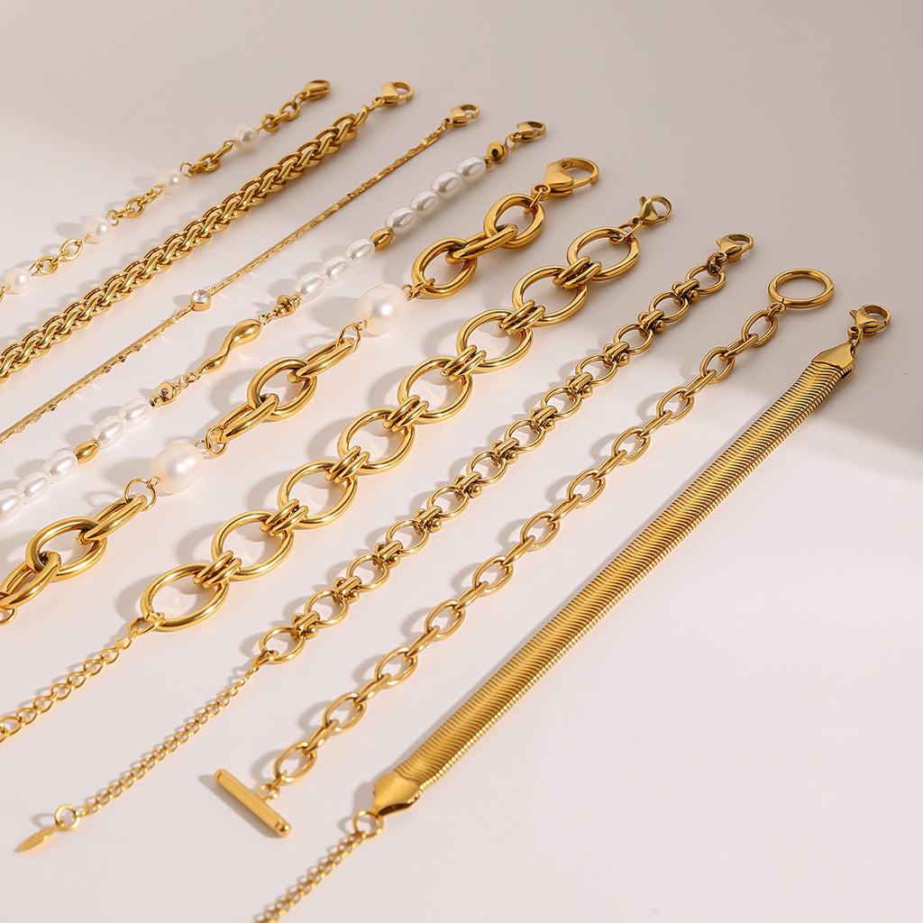 Damen-Armband aus Edelstahl mit Goldperle