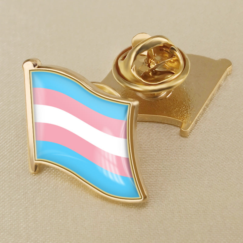 Metal rainbow badge