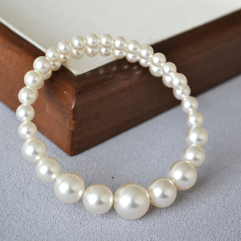 Pulsera de perlas de tamaño degradado para damas elegantes
