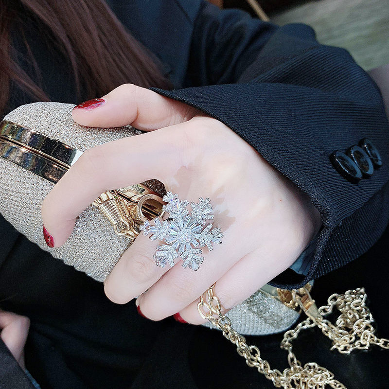 Anillo giratorio con temperamento de copo de nieve rotatorio