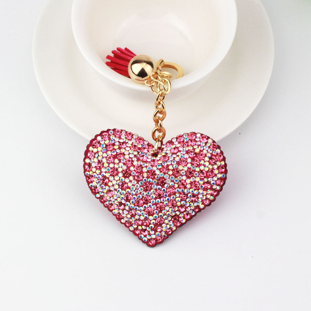 Llavero de franela con forma de corazón de durazno y diamantes de colores