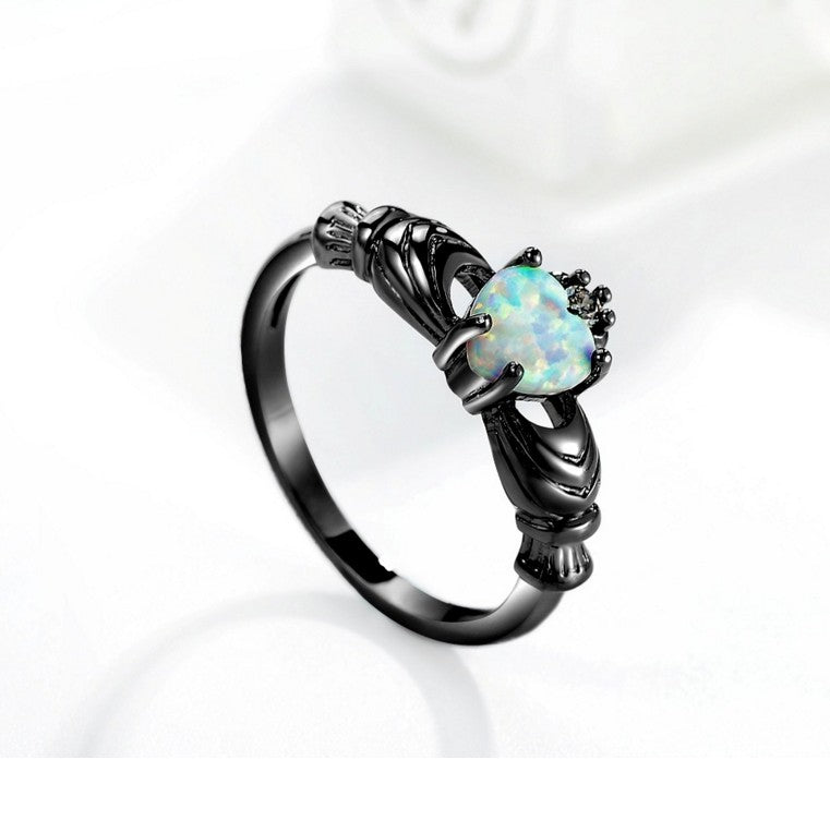 Herz-Opal-Kronen-Pistolen-Schwarzring