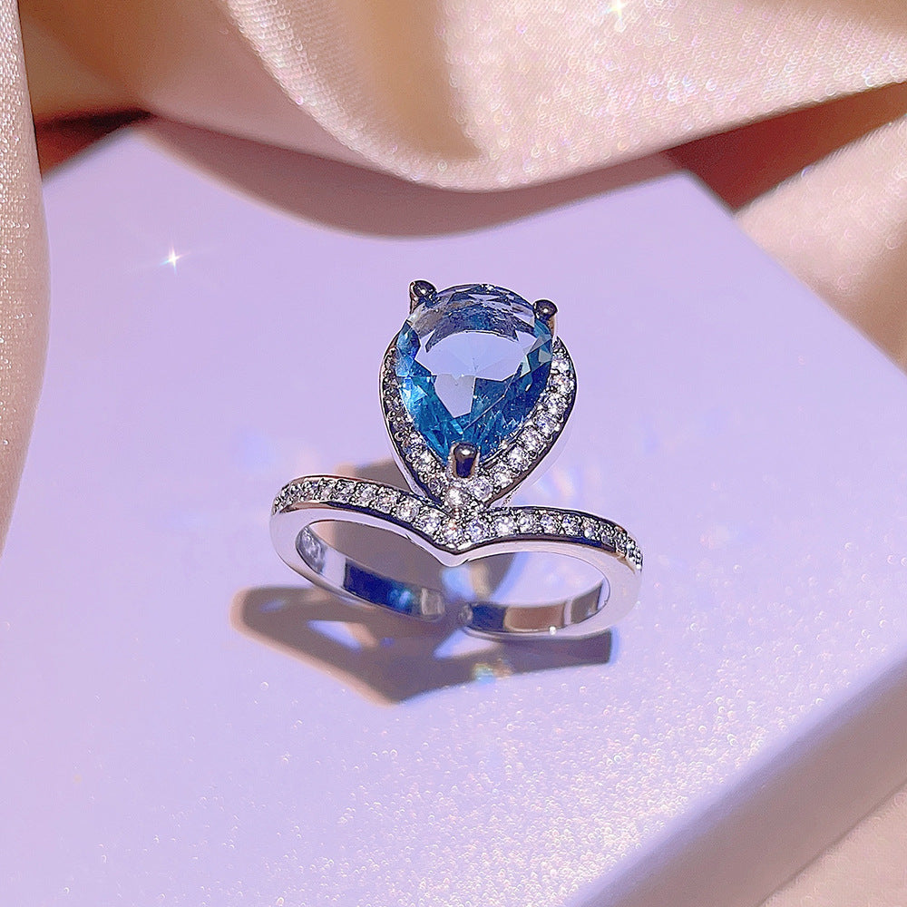 Damen-Schmuckset mit blauen Zirkonen (Ring, Ohrringe, Halskette)