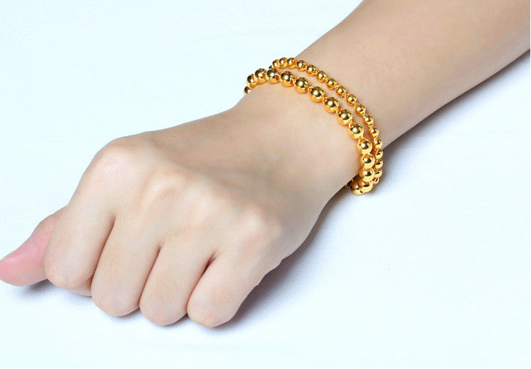 Herren-Armband aus runden Perlen mit 24k Goldimitation