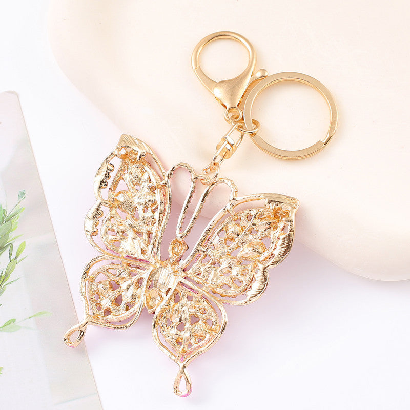 Llavero de mariposa de metal con diamantes de imitación, colgante pequeño