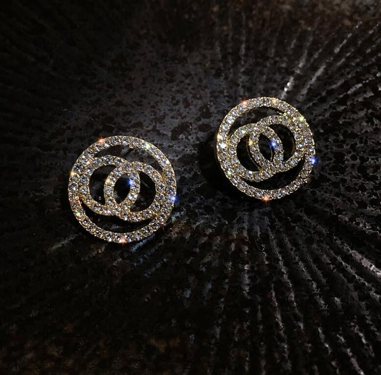 Aretes redondos de diamante completo