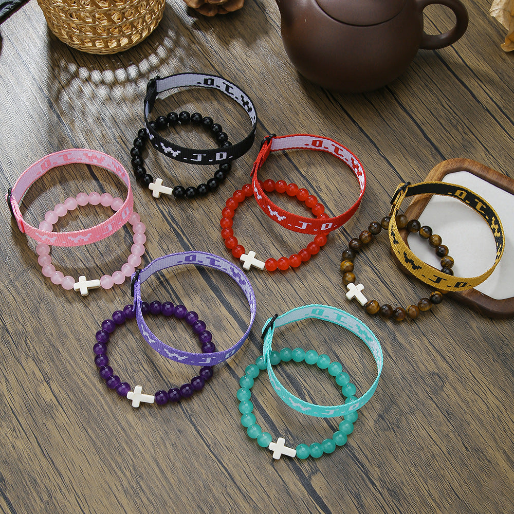 Pulsera con letras WWJD y dije de cruz turquesa