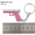 Llavero de rueda izquierda de aleación P92 modelo G17 Sand Eagle