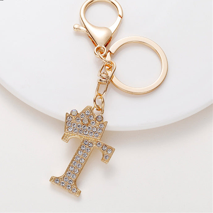 Llavero de metal con incrustaciones de diamantes y el alfabeto de la corona inglesa de 26 letras