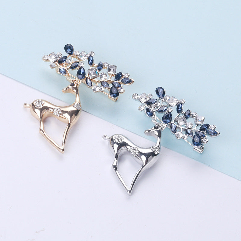 Broche sencillo de aleación con diamantes de imitación y ciervo sika