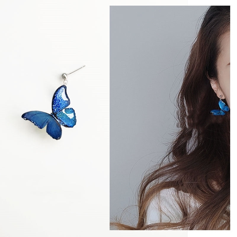Pendientes largos de plata de ley S925 con perlas y mariposas azules