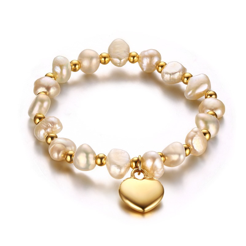 Pulsera hecha a mano de perlas de agua dulce con bolas de acero de titanio