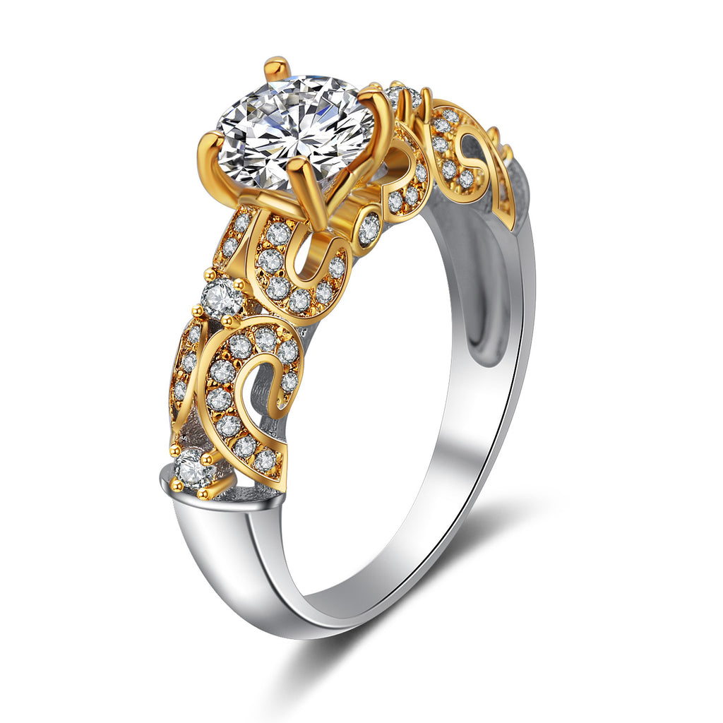 Anillo con gema de simulación engastada con cuatro garras