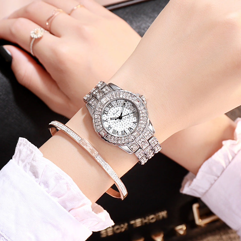 Reloj de cuarzo de aleación con diamantes de imitación simple de moda para mujer