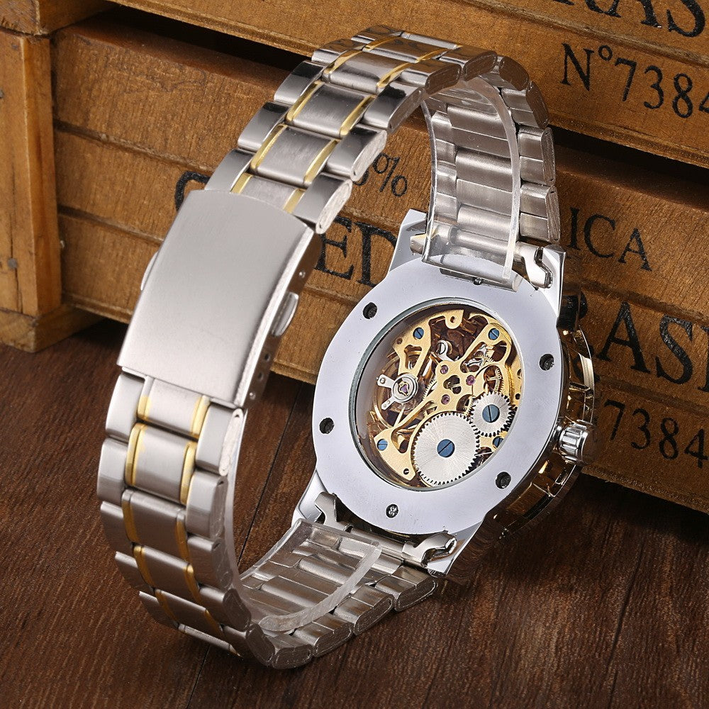 Die Gewinner-Herrenmode Business Casual Space Gravur Goldarmband Handaufzug-Mechanikuhr