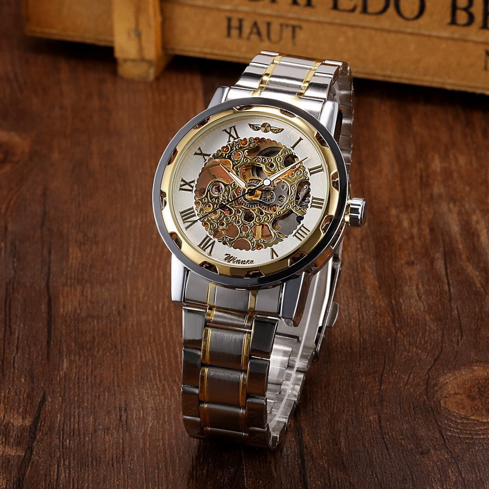 Die Gewinner-Herrenmode Business Casual Space Gravur Goldarmband Handaufzug-Mechanikuhr