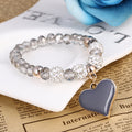 Elastisches Armband & Armreif mit Herz und Kristallen