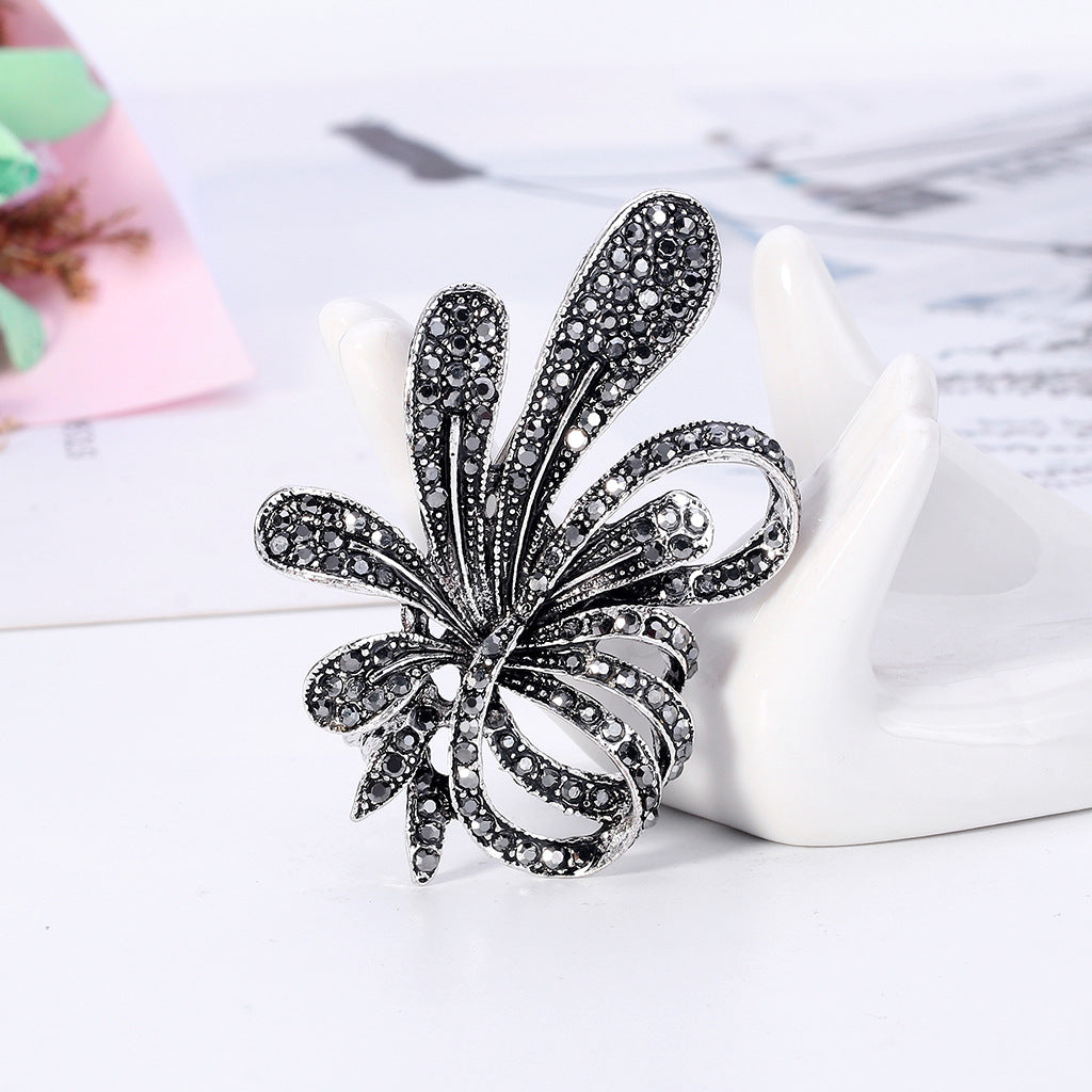 Broche de lazo floral vintage de moda