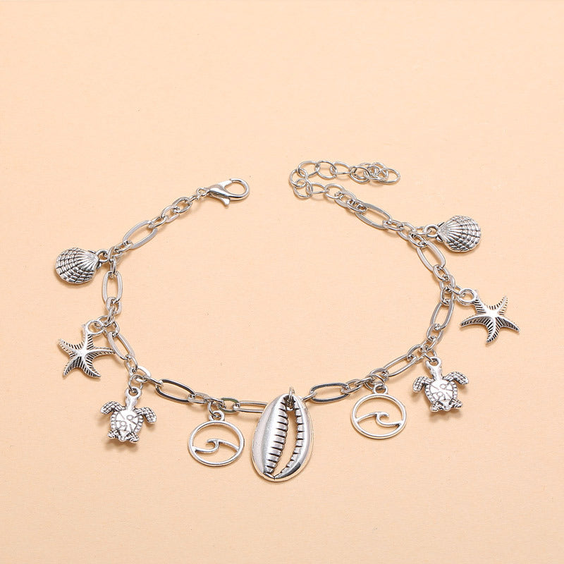 Tobillera con colgante de estrella de mar, ola, concha y tortuga, de la serie Beach Ocean