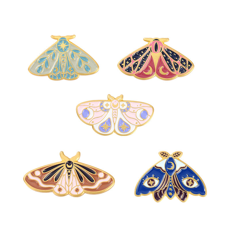 Broche de pintura con forma de mariposa y polilla con goteo de aceite creativo