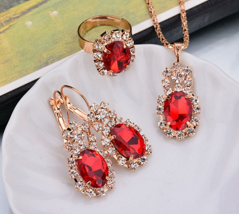 Edelstein-Krallenketten-Set mit Halskette, Ohrringen und Ring