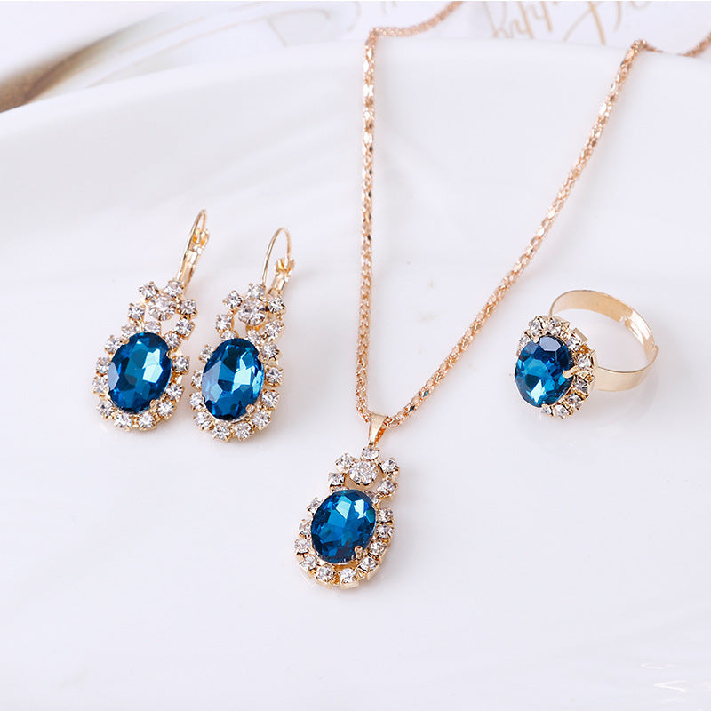 Edelstein-Krallenketten-Set mit Halskette, Ohrringen und Ring