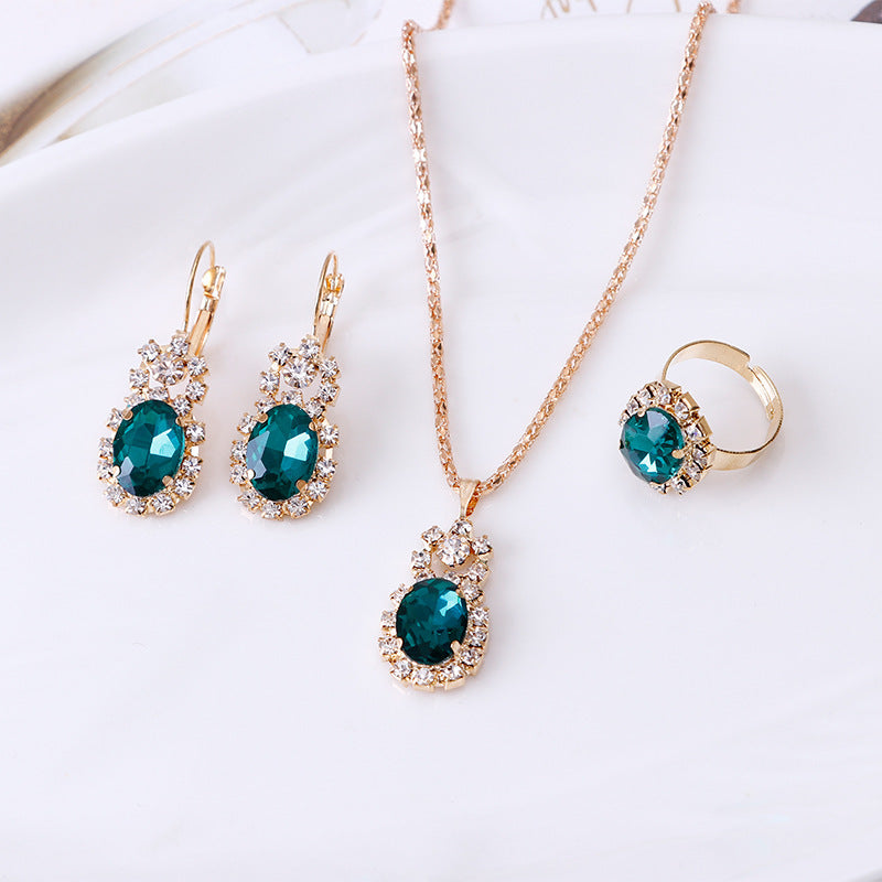 Edelstein-Krallenketten-Set mit Halskette, Ohrringen und Ring