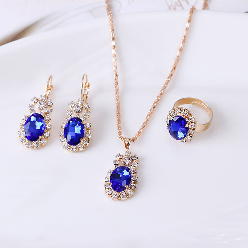 Edelstein-Krallenketten-Set mit Halskette, Ohrringen und Ring