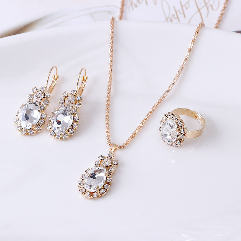 Edelstein-Krallenketten-Set mit Halskette, Ohrringen und Ring