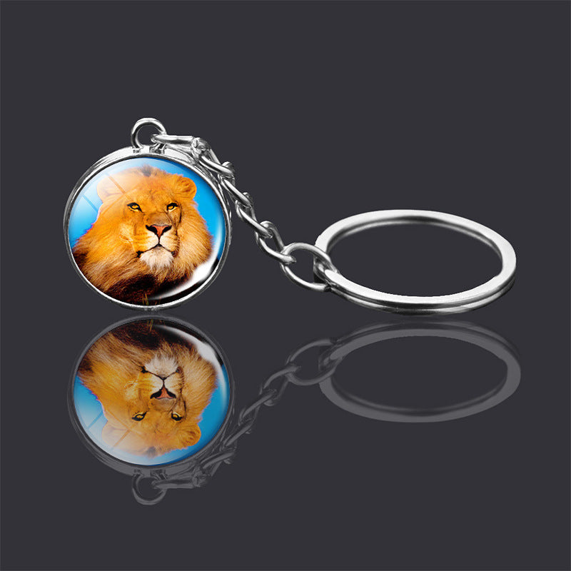 Adorno de llavero de bola de cristal de doble cara con animal