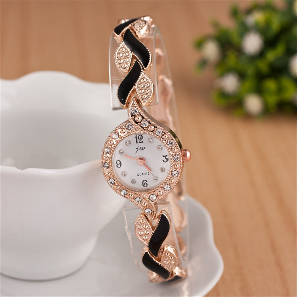 Reloj de pulsera de cuarzo con hojas