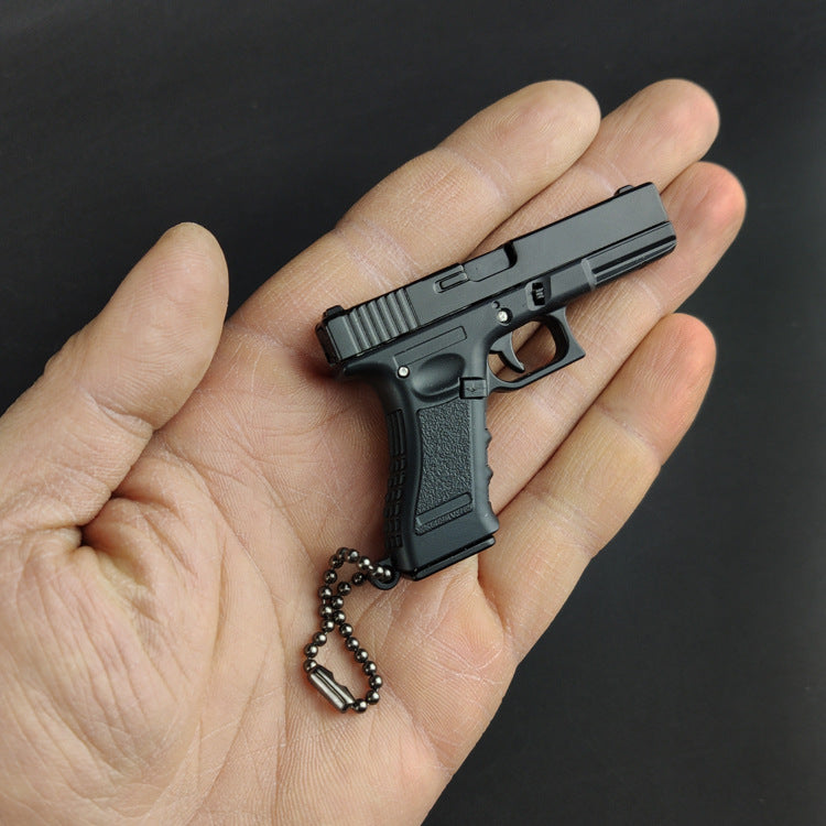 G17 Llavero de aleación con forma de pistola, modelo de juguete, regalo, colgante