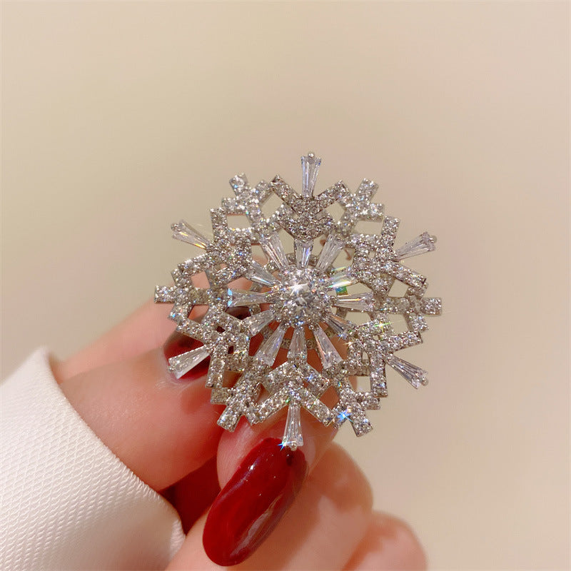 Broche giratorio de circonitas de copo de nieve estéreo Advanced Sense