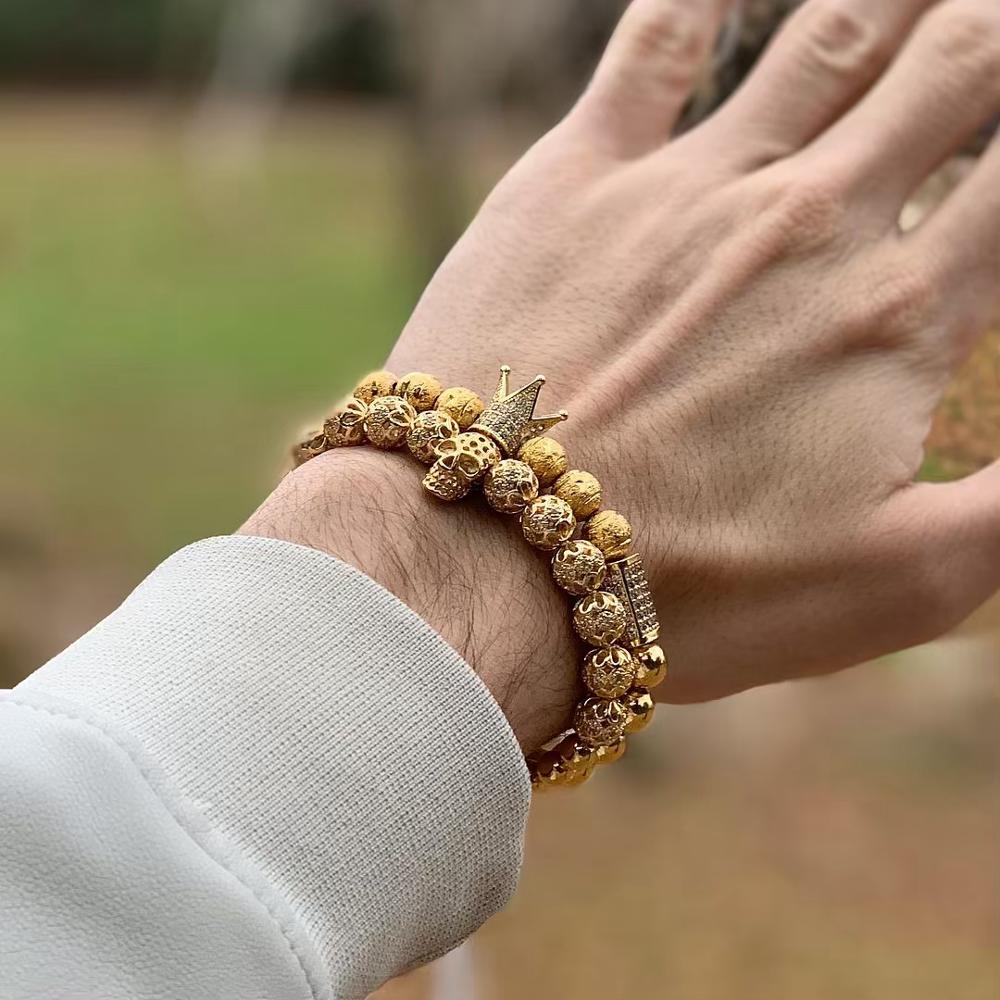 Herrenarmband Schmuck Krone Charm besetzt Zirkonia Makramee Perlen Armbänder
