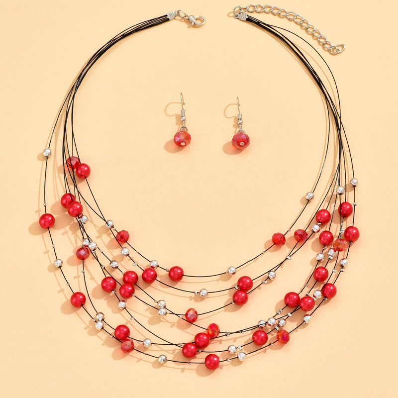 Conjunto de pendientes y collar bohemio de varias capas con conchas y cristales