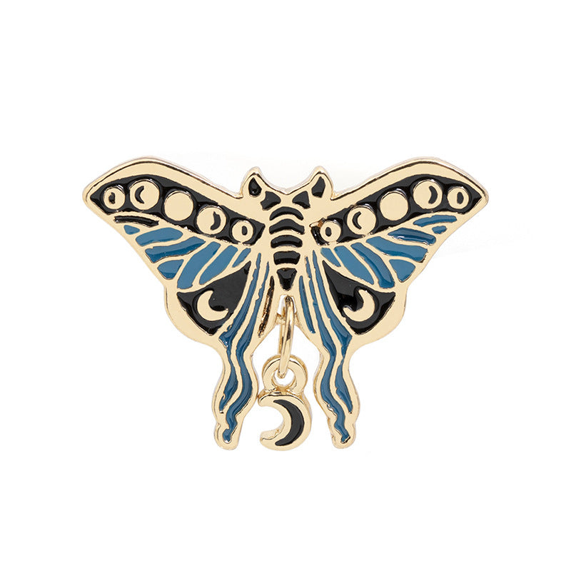 Broche de pintura con forma de mariposa y polilla con goteo de aceite creativo