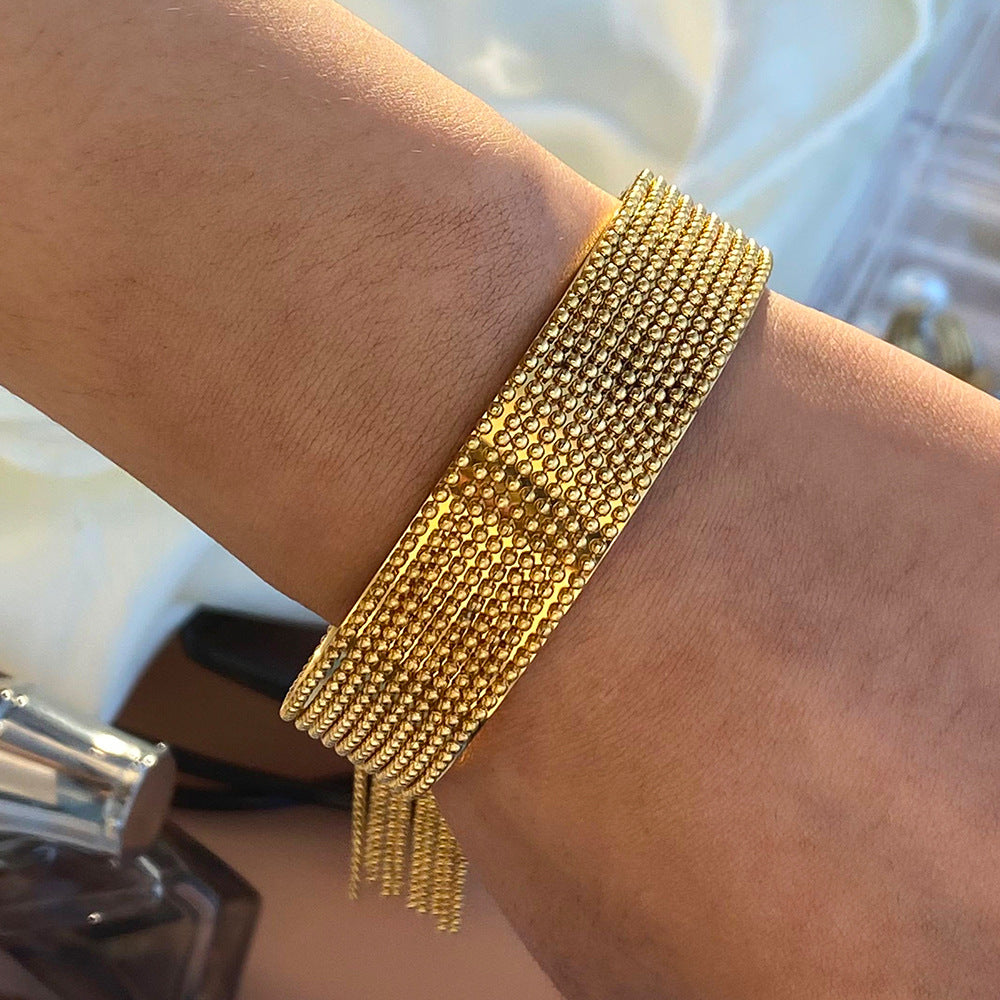 Pulsera de borla abierta de acero inoxidable nicho