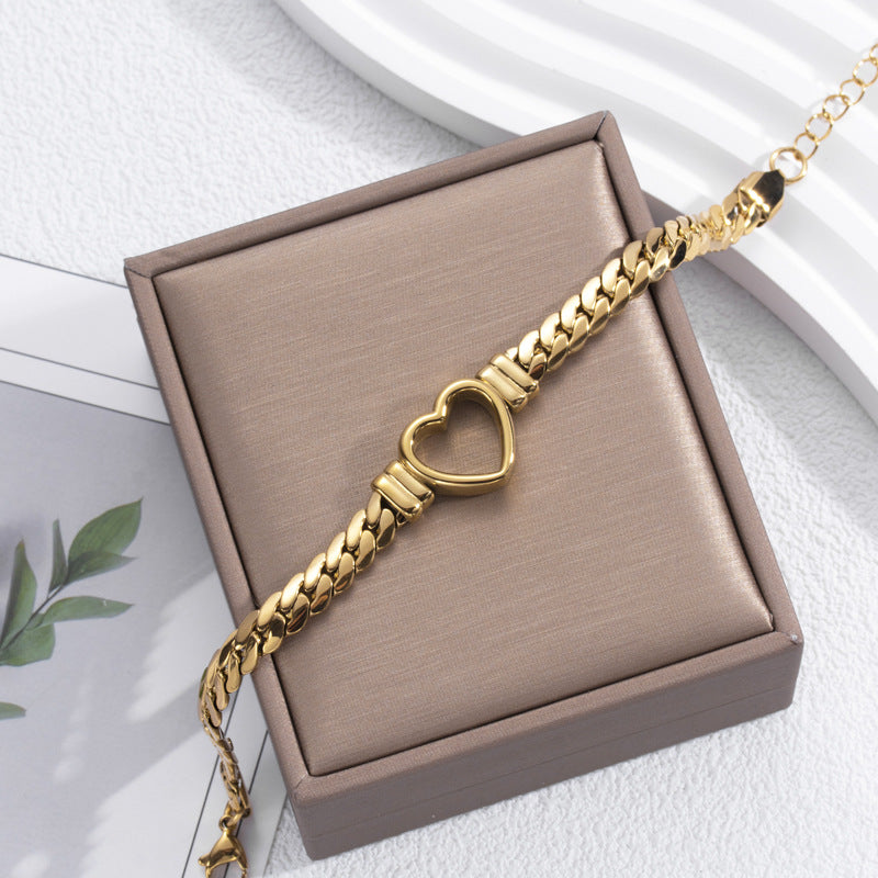 Pulsera de acero de titanio con corazón hueco, sencilla y a la moda
