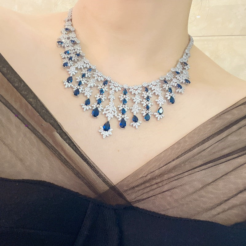 Blaues Strass-Zirkon-Quasten-Halsketten-Ohrring-Armband-Vierteiliges Set