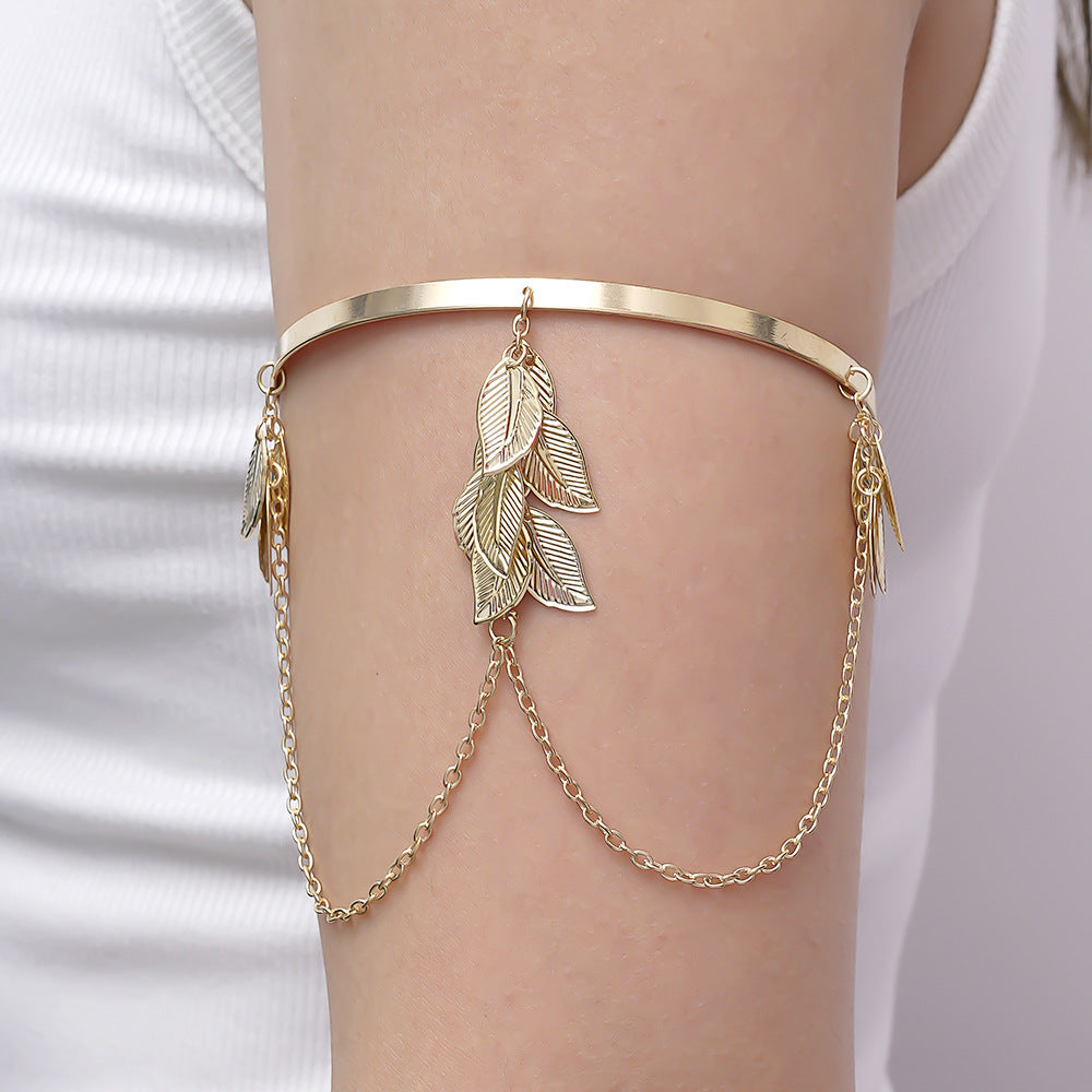 Handcrafted Gold-plated Geometric Cuff Bracelets And Boho-chic Metal Tassel Arm Rings With Vintage-inspired Exaggerated Water Drop Designs, Offering Unisex Luxury Accessories In Open Bangle Styles